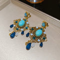 Gold Tone Blue Cabochon And Teardrop Chandelier Earrings view 6