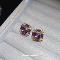 Gold Tone Square Stud Earrings with Purple Crystal Centers view 4