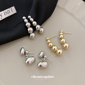 Graduated Silver Tone Metal Ball Drop Stud Earrings