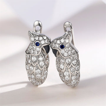 Silver Tone Parrot Huggie Earrings With Clear CZ And Blue Eyes