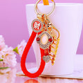 Gold Tone Ladder and Ruyi Keychains with Crystal Heart Details view 4