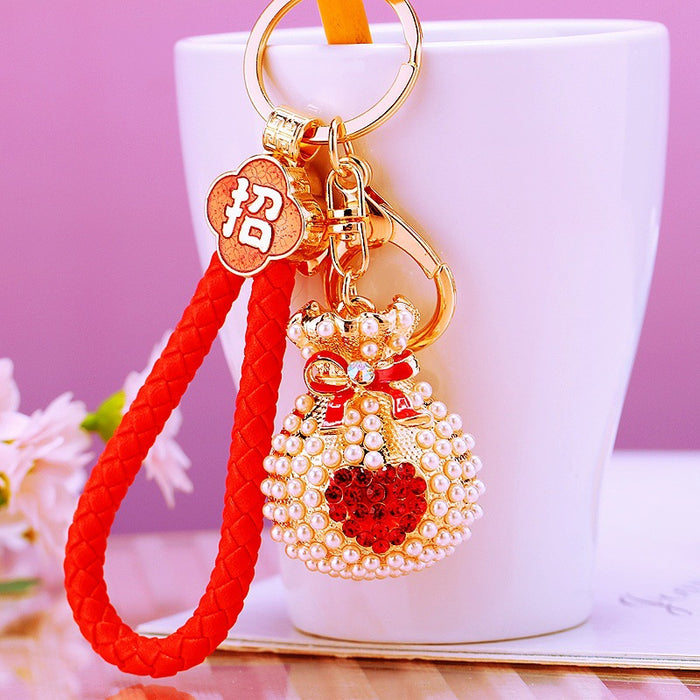 Pearl-Covered Pouch Keychains with Heart Crystals in Eight Colors