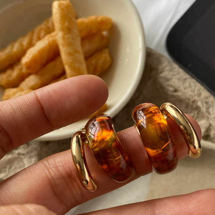 Amber Brown Resin Hoop Earrings With Gold Tone Frames