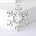 Pearl Snowflake Brooch With Faceted Crystals And Polished Metal Details view 7