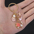 Four Pink and Blue Ocean Pearl-Look Metal Keychain Designs view 2
