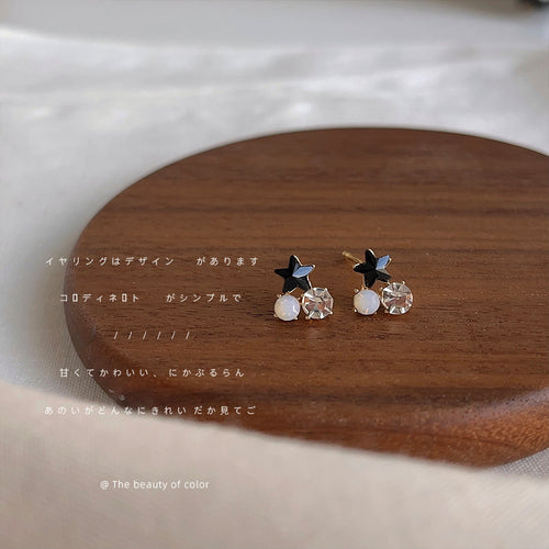Mini black star studs on round wood board with fabric