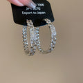 Crystal Textured Hoop Earrings In Silver And Gold Tones view 6