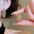 Faceted Metal Hoop Earrings in Gold and Silver Tones view 1