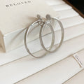 Oversized Polished Hoop Earrings with Distinctive Textured Details view 6