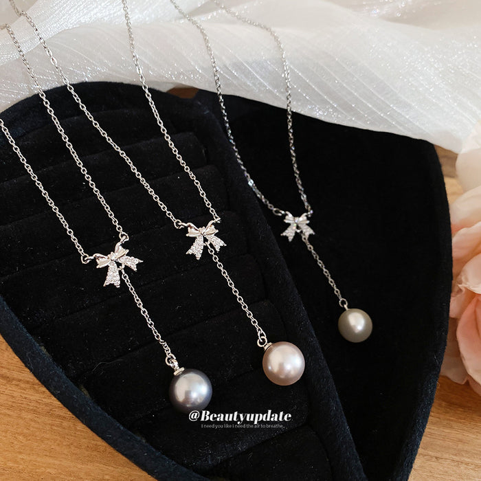Bow And Pearl Drop Silver Tone Necklace In Three Colors