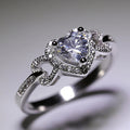 Silver Tone Heart Clear Stone Halo Twist Band Ring view 2