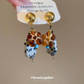 Mottled Stone Flower Drop Earrings In Gold Tone For Distinctive Statement Styling view 2