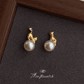 Gold Tone Cat And White Pearl Like Ball Stud Earrings view 4