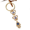 Gold Rhinestone Evil Eye Keychain With Butterfly And Hamsa Charm view 5