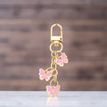 Pink Triple Butterfly Charm Keychain With Gold-Tone Lobster Clasp view 1