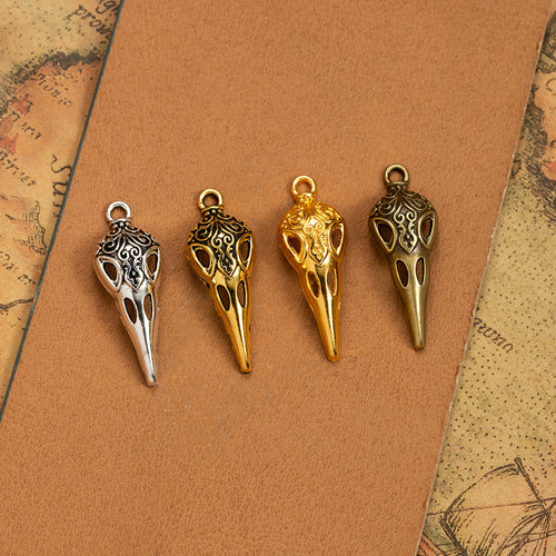 Bird Skull Metal Charm shown in grouped finish view