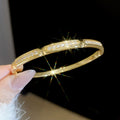 Crystal Pave Hinged Bangle Bracelets in Gold and Silver Tone view 2
