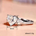 Heart-Shaped Clear Solitaire Three-Stone Ring In Silver Tone view 4