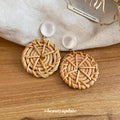 Woven Rattan Circle and White Cabochon Earrings with Decorative Details view 2