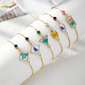 Gold Tone Pressed Flower Crystal Slider Bracelets in Nine Designs view 1