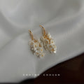 Gold Tone Long Hook And White Flower Cluster Tassel Earrings view 4