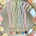 Six Color Cube Bead Necklaces With Gold Tone Heart Pendants view 2