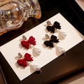 Black and Red Bow Pearl Look Long Dangle Stud Earrings view 1
