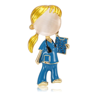 Front view of the nurse figure brooch showing a faceless nurse figure in colored enamel scrubs or a white coat