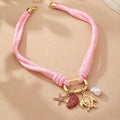 Shell Starfish Turtle And Pearl Charm Necklace In Gold Tone Metal view 2