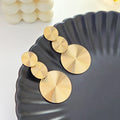 Gold Triple Spiral Disc Geometric Statement Stud Earrings view 6