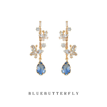 Gold Tone Clear Stone Floral Branch And Blue Teardrop Stud Earrings