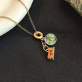 Red Tram and Globe Travel Charm Necklace in Two Metal Tones view 3