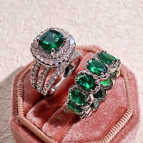 Second product view showing oversized square halo ring and oval-stone matching band