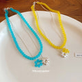Double Strand Beaded Flower Necklace in Blue and Yellow view 4