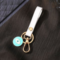 Gold Tone Wristlet Strap Evil Eye Charm Clip Keychains view 7