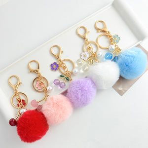 Faux Fur Pom Keychain with Gold-Tone Flower Charm and Cherry Beads