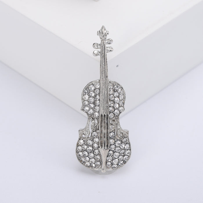 Crystal Violin Brooch with Bow Detail in White or Black