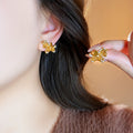 Gold Tone Horse Stud Earrings With Clear Crystal Accents view 3