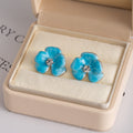 Four Blue Petal Shape Clear Center Flower Stud Earrings view 4