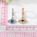 Gold and Silver Tone Marquise Crystal Blue Evil Eye Huggie Earrings view 4