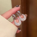 Silver Tone Crystal Teardrop Huggie Earrings With Open Centers view 6