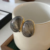 Gray Oval