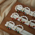 Stretch Pearl Bead Rings Red Green Faceted Stones Gold Accents view 3