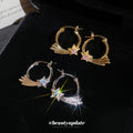 Crystal Wing and Star Hoop Earrings in Two Metal Tones view 1