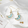 Gold Tone Crescent Moon Pressed Flower Drop Earrings in Eight Designs view 4
