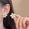 White Pearl Look Five Petal Gold Center Stud Earrings view 1