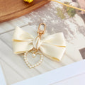 Satin Ribbon Bow Keychain with Pearl Heart Charm Accent view 10