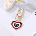 Gold Tone Layered Round Heart and Lash Evil Eye Clip Keychains view 11