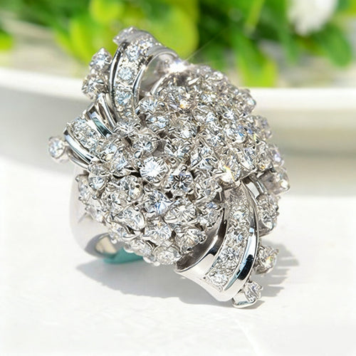 Second product view showing silver-tone oversized clear-stone floral cluster statement ring