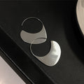 Silver Tone Wide Crescent Wire Hook Earrings With Metal Details view 3